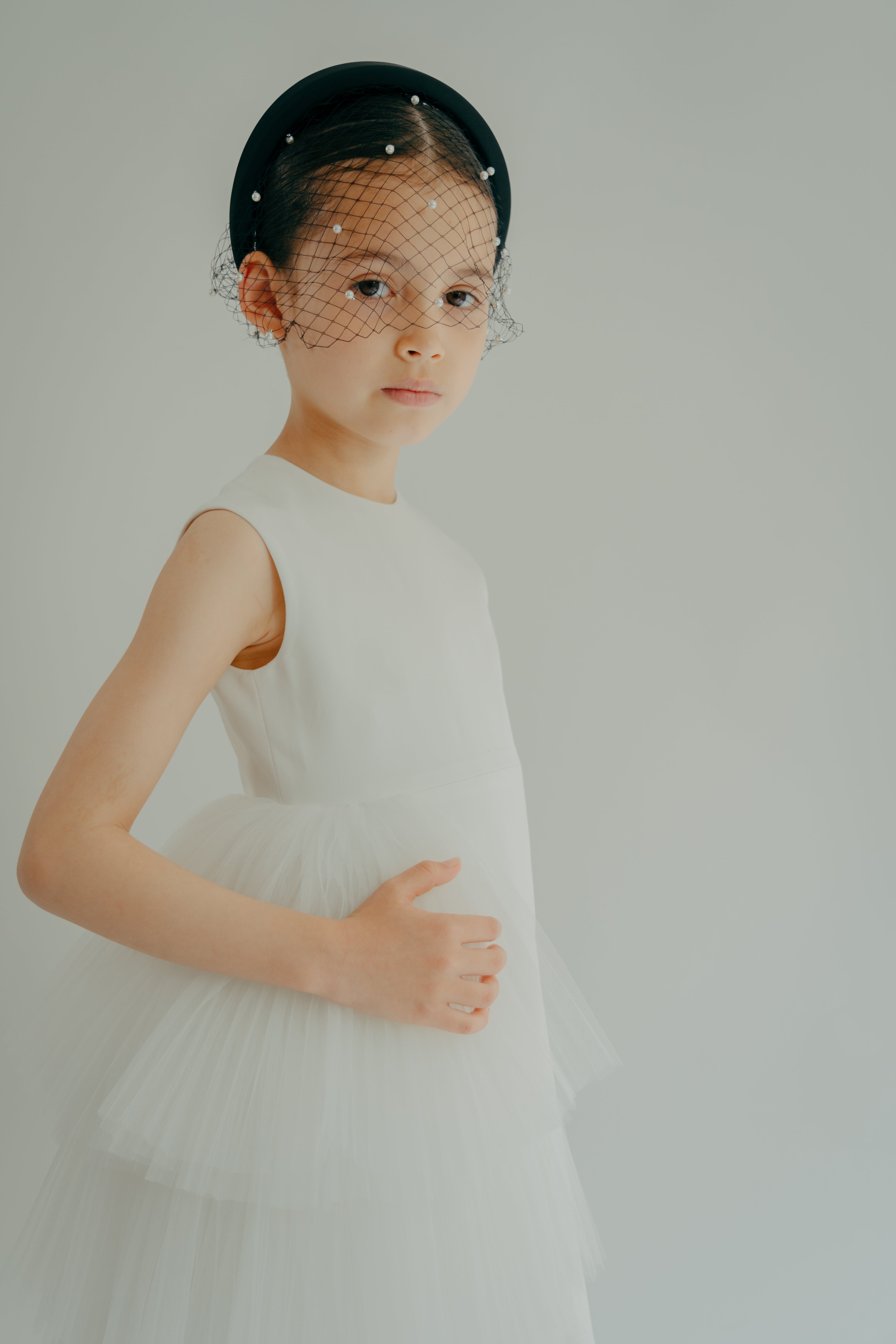 white asymmetrical dress no sleeves