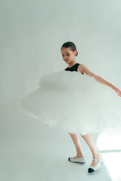 Girl twirling wearing a bicolor A line dress